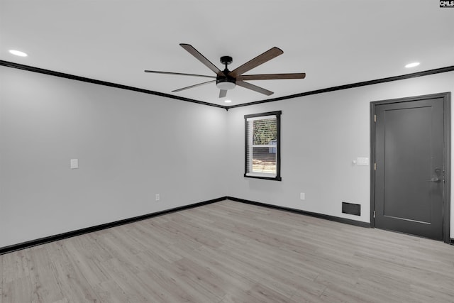 unfurnished room with light hardwood / wood-style floors, ceiling fan, and crown molding