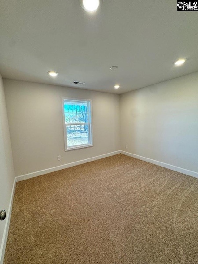 view of carpeted spare room