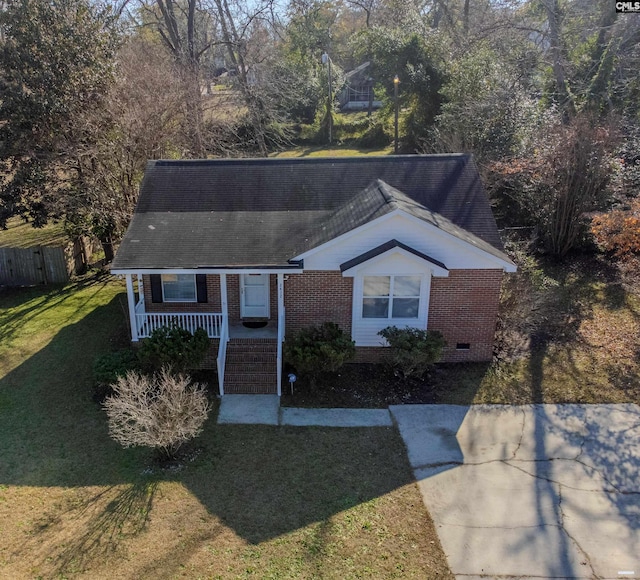 view of front of property with a front lawn and a porch