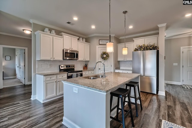 kitchen with white cabinetry, sink, and stainless steel appliances