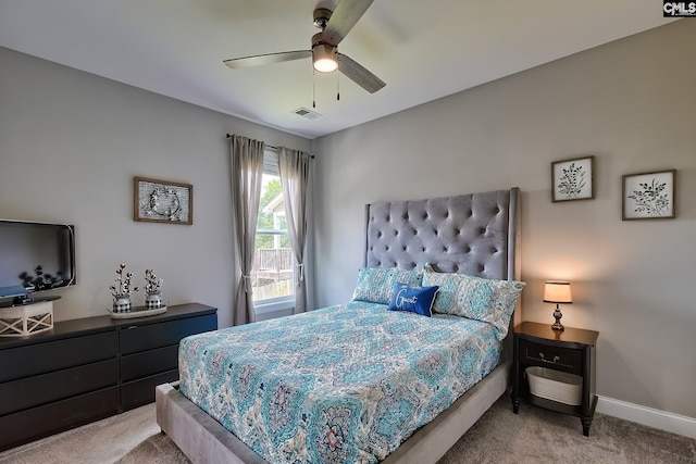 carpeted bedroom featuring ceiling fan