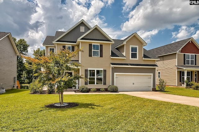 craftsman house featuring a garage and a front lawn