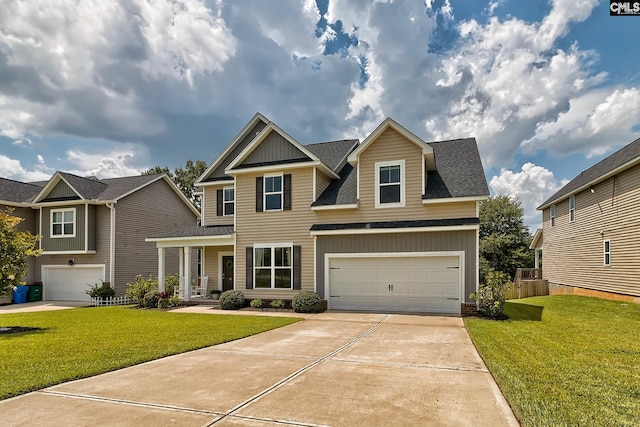 view of front of home featuring a garage and a front lawn