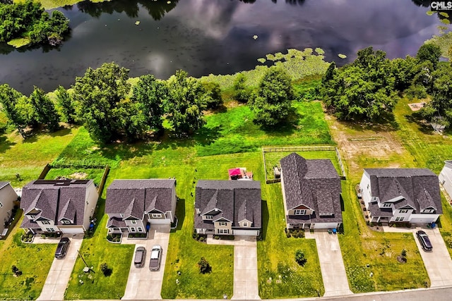 drone / aerial view with a water view