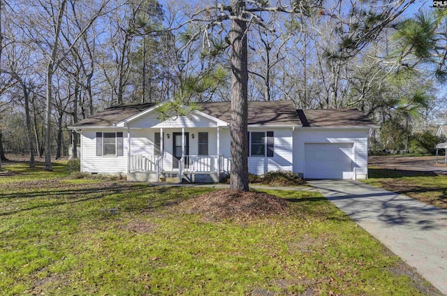 ranch-style house featuring a garage and a front yard