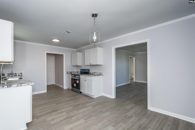 kitchen featuring sink, crown molding, pendant lighting, stainless steel electric range, and white cabinets