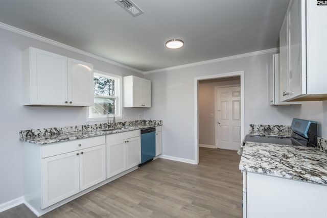 kitchen with dishwasher, electric stove, sink, light stone countertops, and white cabinetry