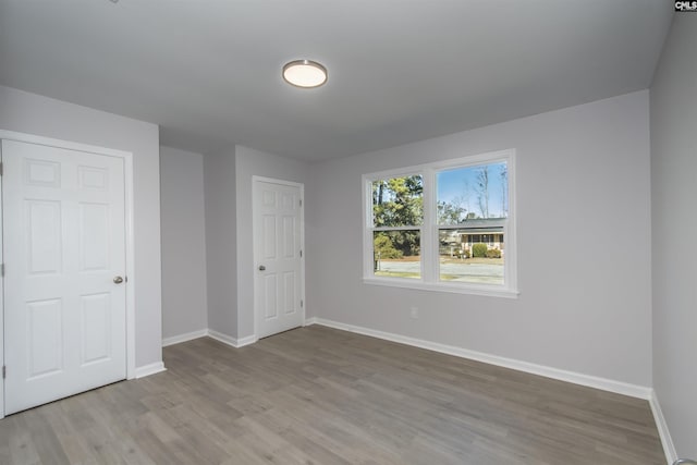 unfurnished bedroom featuring light hardwood / wood-style floors