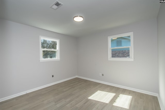 empty room featuring light hardwood / wood-style floors