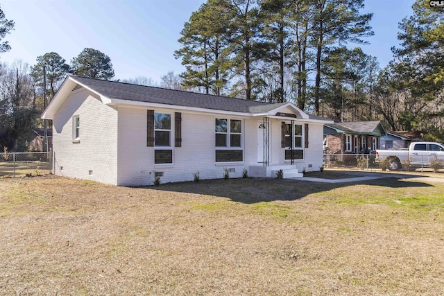 ranch-style home with a front yard