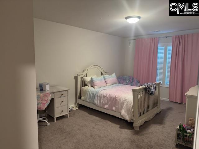 bedroom featuring carpet flooring