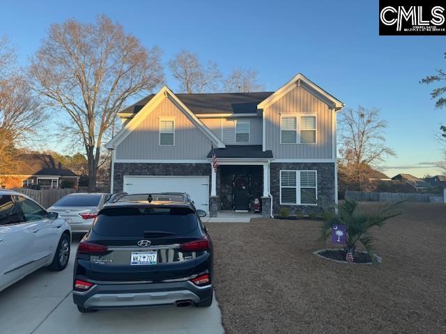 view of front of home featuring a garage