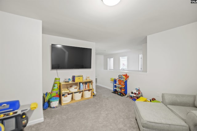 game room with light colored carpet