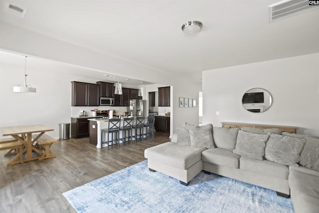 living room featuring dark hardwood / wood-style floors