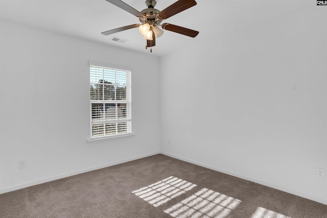 empty room with carpet and ceiling fan