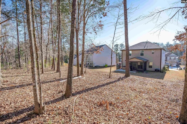 view of yard featuring a sunroom