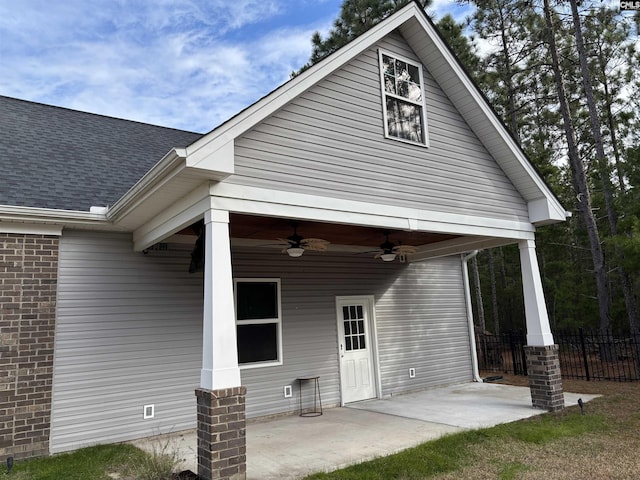 rear view of house with a patio and ceiling fan