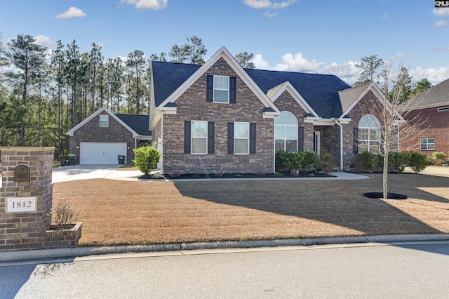 front facade with a front lawn