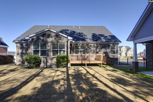 rear view of house with a deck