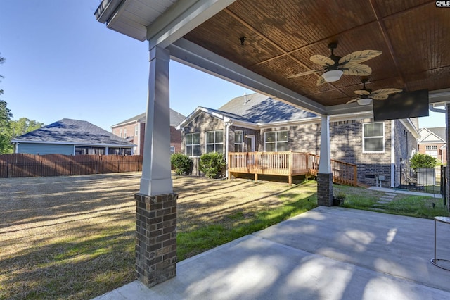 view of patio / terrace featuring ceiling fan and a wooden deck