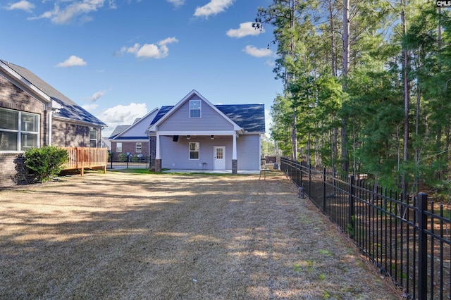 view of front of home featuring a deck and ceiling fan