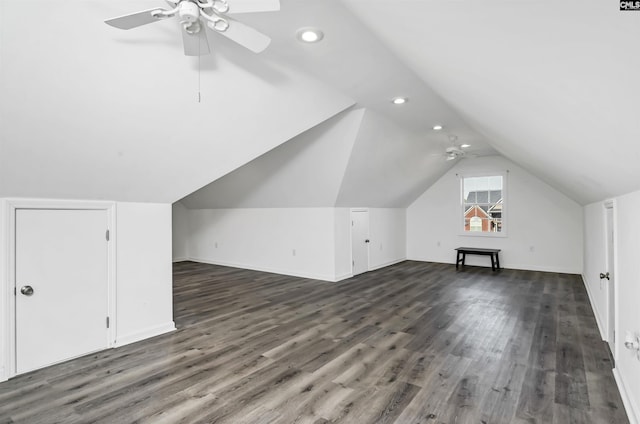 bonus room featuring ceiling fan, dark hardwood / wood-style floors, and vaulted ceiling