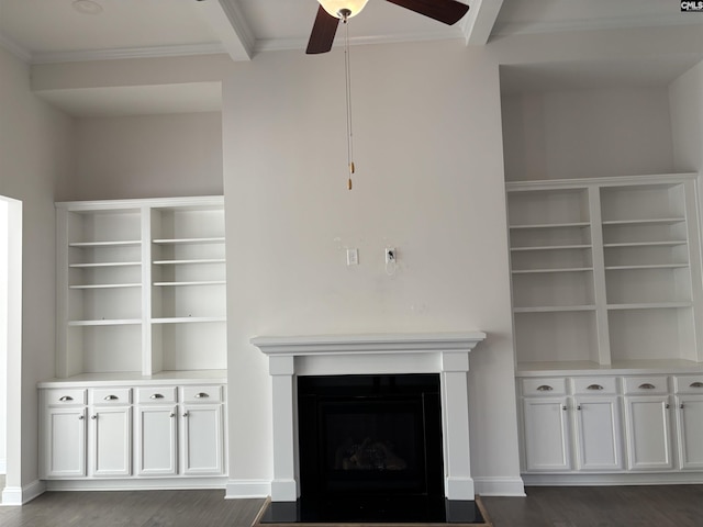 unfurnished living room featuring beam ceiling, dark hardwood / wood-style flooring, and ceiling fan