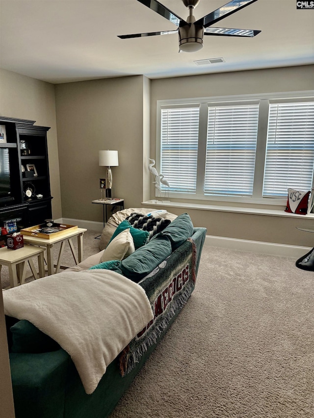 bedroom featuring ceiling fan and carpet flooring