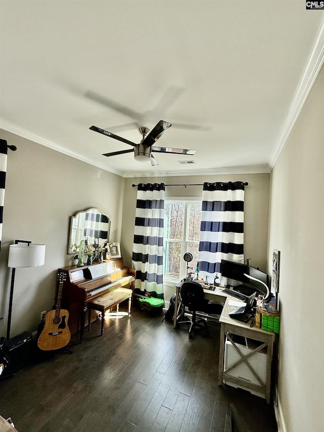 office area featuring ceiling fan, dark wood-type flooring, and crown molding