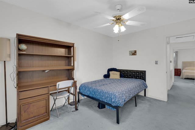 bedroom featuring light carpet and ceiling fan