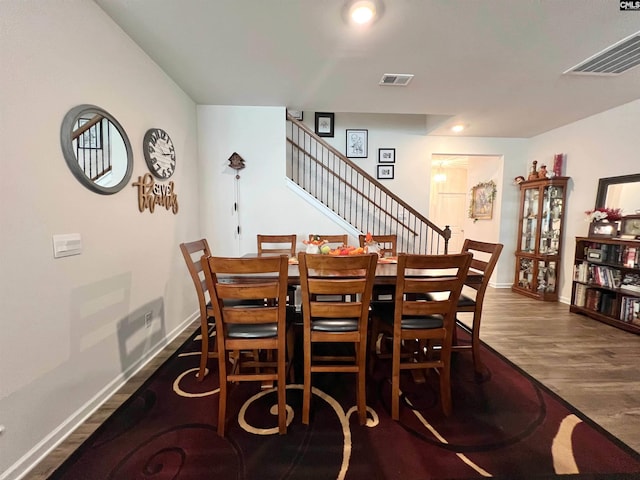 dining room featuring dark wood-type flooring