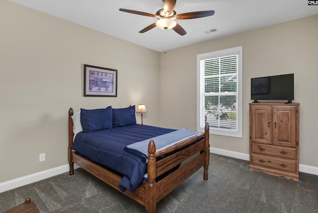 carpeted bedroom featuring ceiling fan