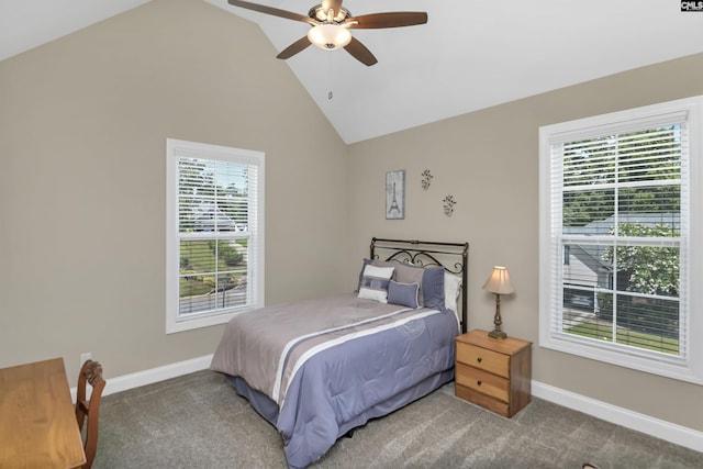 carpeted bedroom featuring ceiling fan and vaulted ceiling