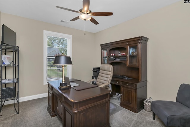 office area with ceiling fan and carpet