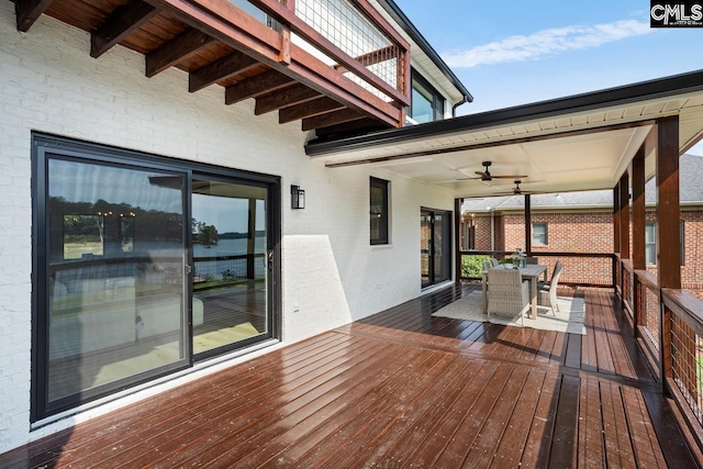 wooden deck with ceiling fan