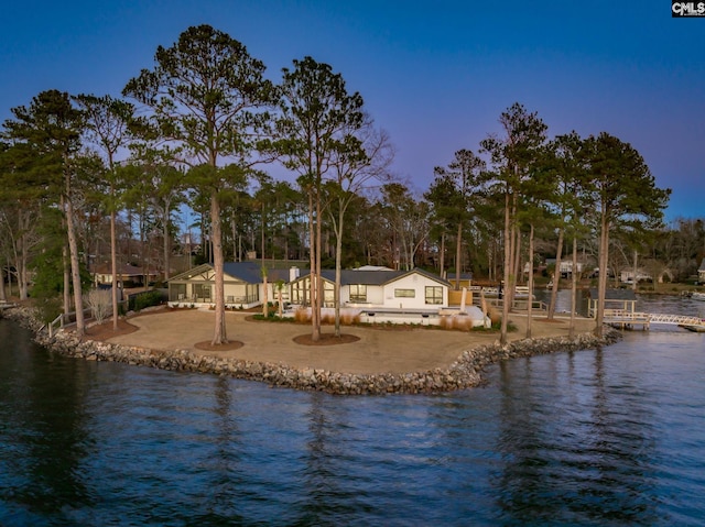 view of water feature with a dock