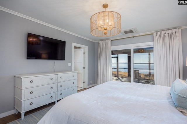 bedroom with ornamental molding, dark hardwood / wood-style flooring, access to outside, and a notable chandelier