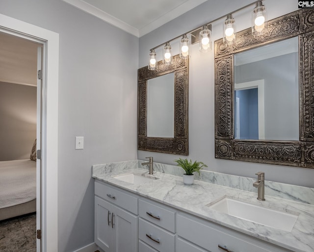 bathroom with vanity and ornamental molding