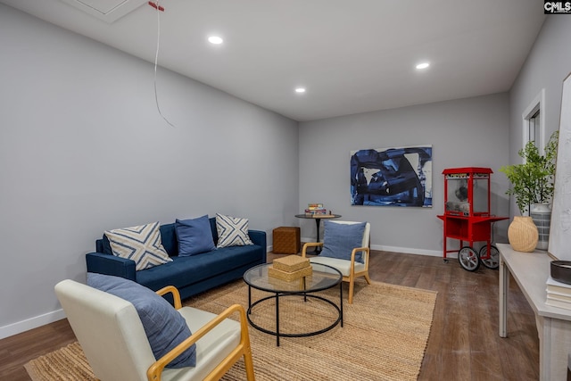 living room with dark hardwood / wood-style flooring