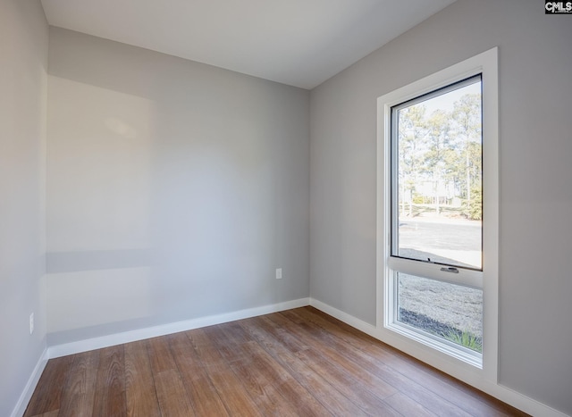 spare room featuring light hardwood / wood-style flooring