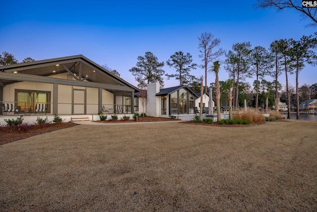 exterior space featuring a lawn