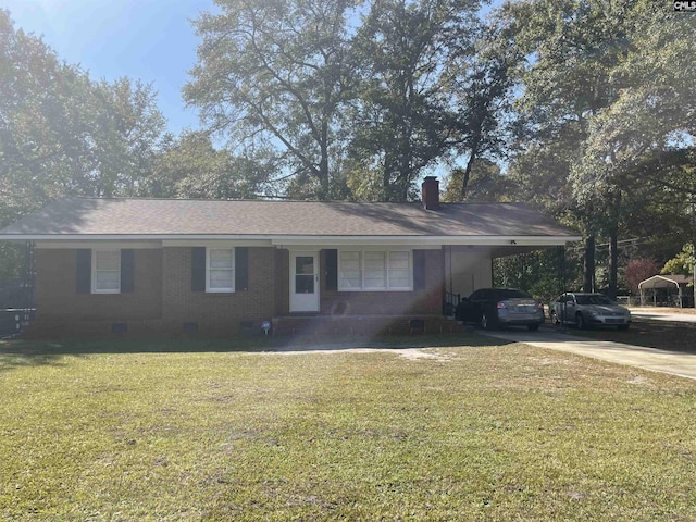 single story home with a front lawn and a carport