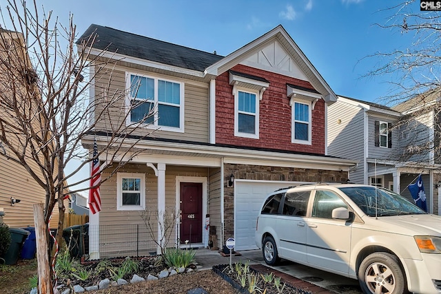 view of front of property with a garage