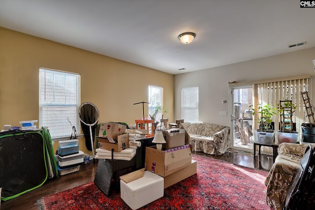 living room with dark hardwood / wood-style floors