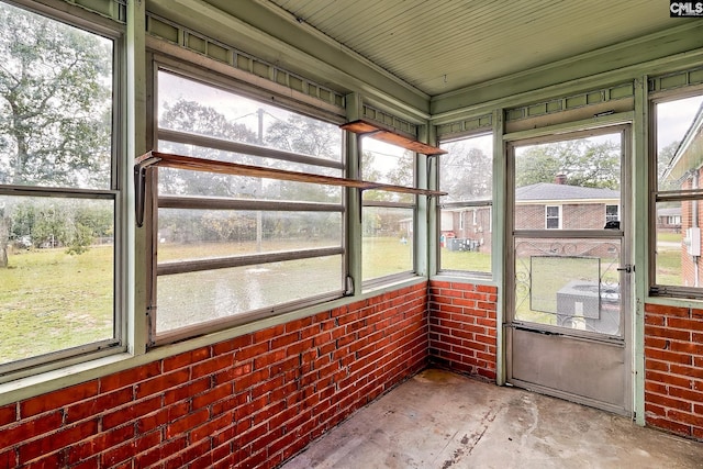 sunroom / solarium featuring a wealth of natural light