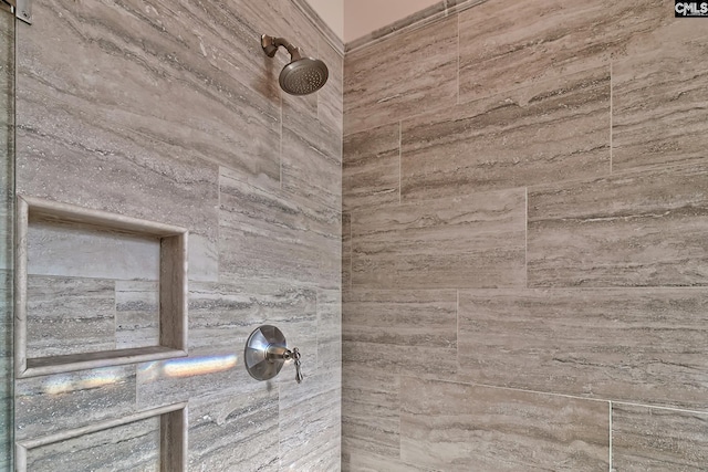 details with a tile shower