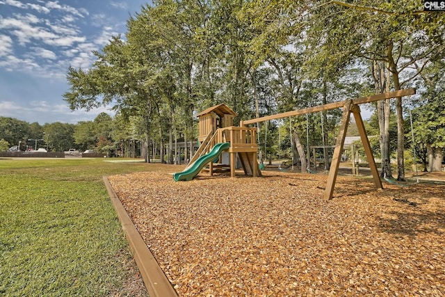 view of jungle gym with a lawn