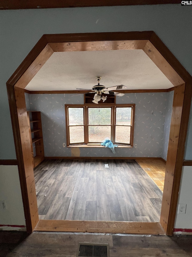 bonus room featuring hardwood / wood-style floors and ceiling fan