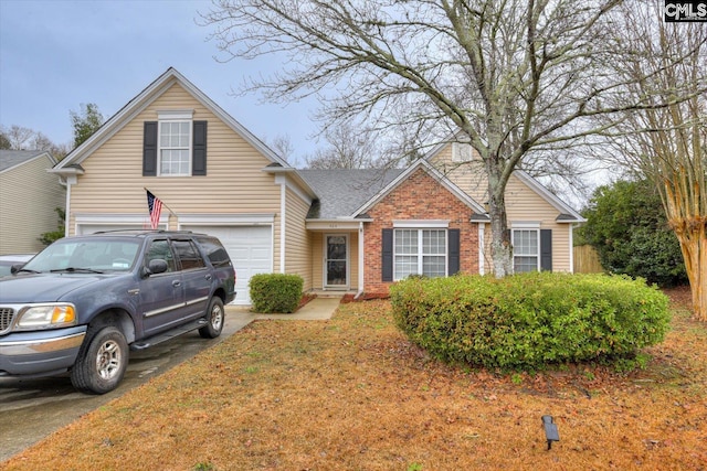 front of property featuring a garage