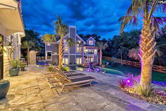 patio terrace at dusk with fence